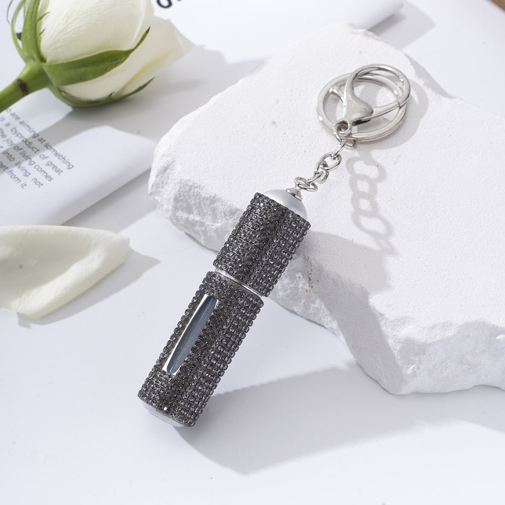 Wholesale  diamond-studded creative perfume bottle keychain is easy to carry